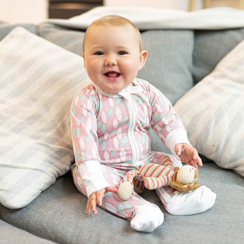 The Pink Leaves ZippySuit. The perfect baby grow has a 2-way zip for quick and easy changes, foldable mitts and foldable feet pouches.